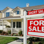 Short Sale sign in front of a house